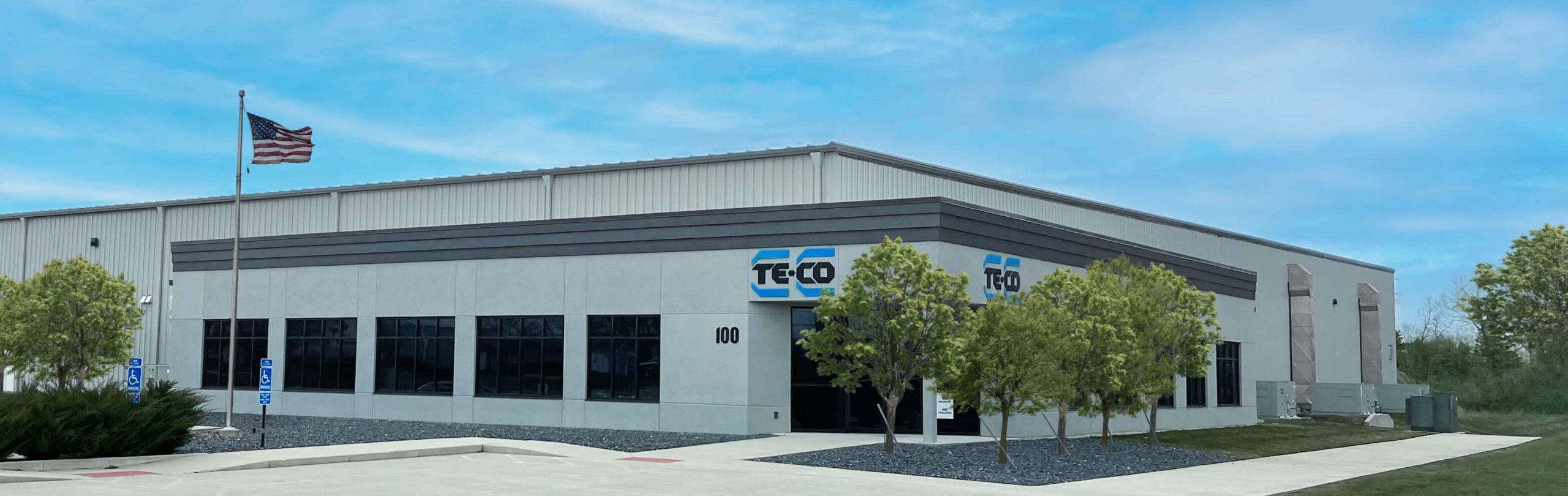 a large building with the word TE-CO on it